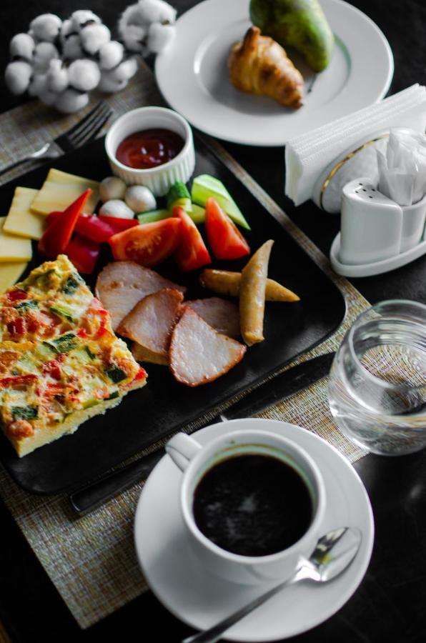 Willing Hotel Minsk Bagian luar foto