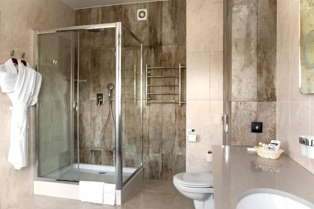 Willing Hotel Minsk Bagian luar foto