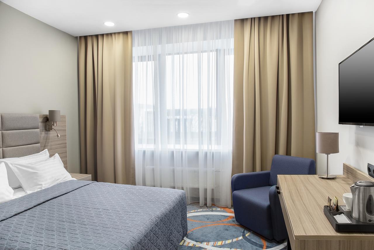 Willing Hotel Minsk Bagian luar foto