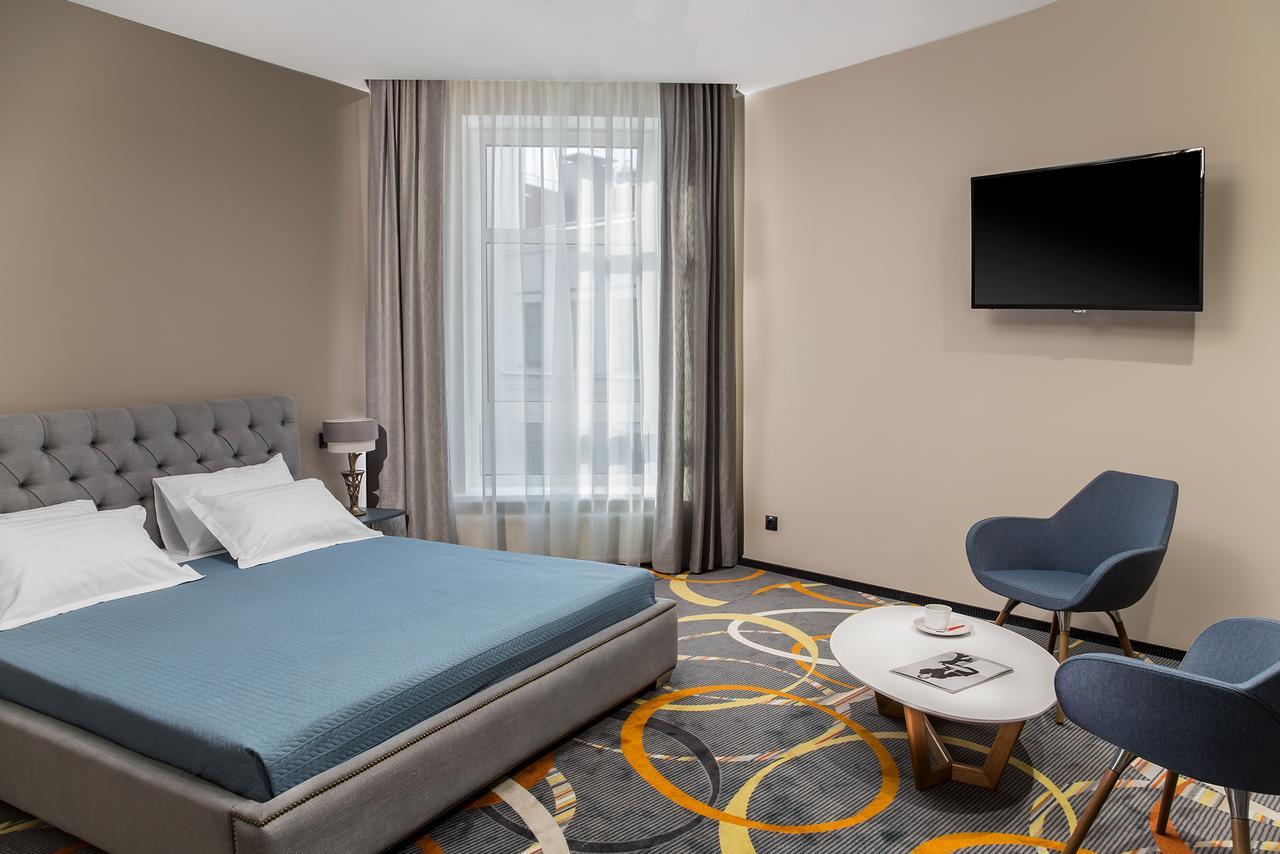 Willing Hotel Minsk Bagian luar foto