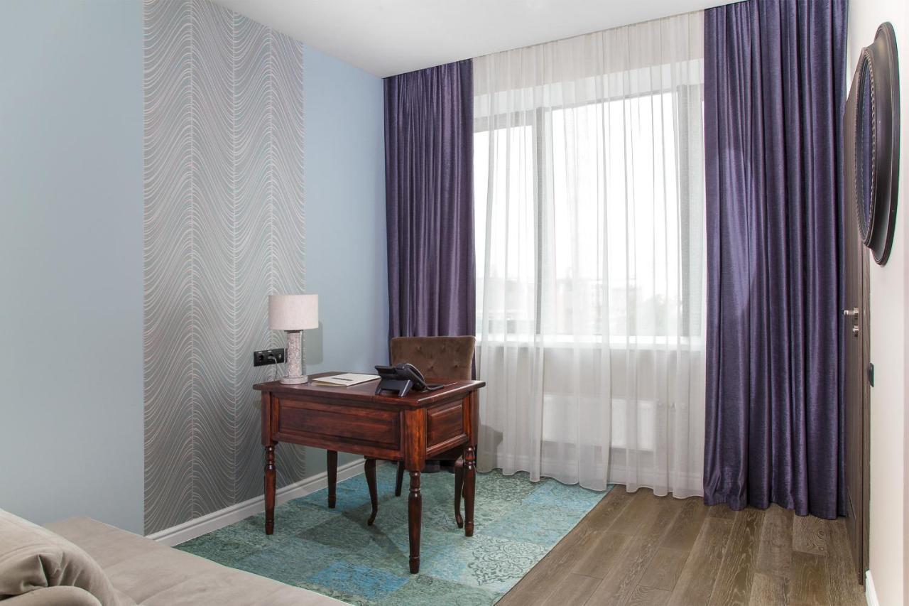 Willing Hotel Minsk Bagian luar foto